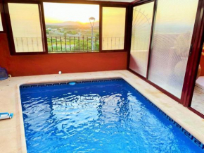 Vivienda de estilo rústico con piscina LA GRANÁ